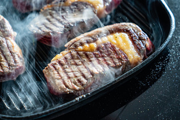 grilled steaks on the pan