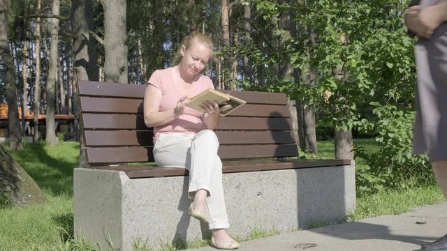 Male pervert in park. man exhibitionist opens coat in front of girl. woman gets scared and runs away.