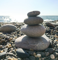 Fototapeta na wymiar Stones on a pebble beach by the sea