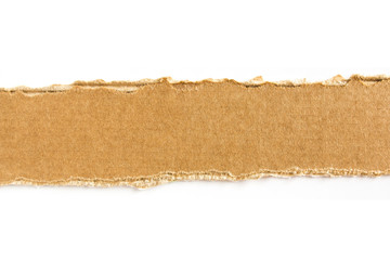 Ripped piece of brown cardboard on white background. Cardboard stripe for advertising text.