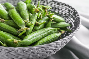 Bowl with tasty fresh peas, closeup