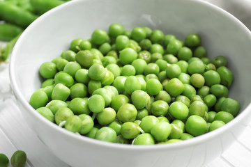 Bowl with tasty fresh peas, closeup