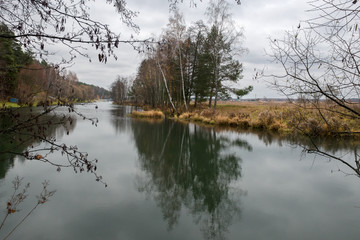 Fototapeta na wymiar Autumn forest river water panorama. Natural color.