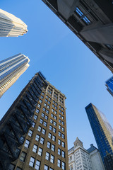 Fototapeta na wymiar Tall office buildings in city