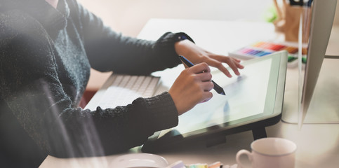 Graphic Designer drawing at work