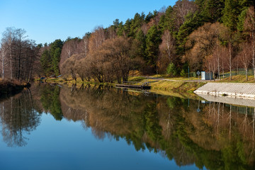 Embankment of the river in the autumn afternoon