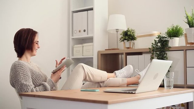 Young woman surfing the internet looking for perfect content