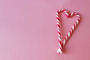 Valentine's Day,  heart shaped lollipop on white background, New Year's Lollipop, New Year. Top view. Copyspace