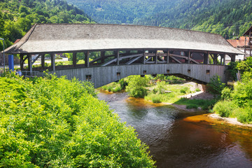 An old wooden bridge in the German town of Forbach. Germany. Black Forest.