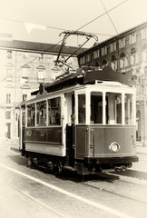 Vintage looking photo of the historical tramway line number ten (from Crocetta to Regio Parco street) stops in Piazza Castello, main square of Turin (Italy)