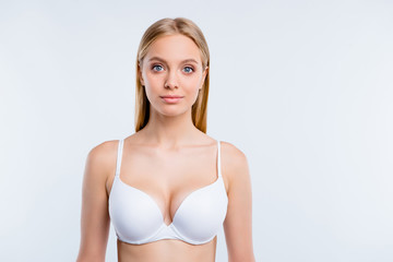 Healthy lifestyle concept. Portrait of nice cute lovely winsome fascinating attractive blonde girl wearing bra isolated over light gray background