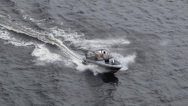 Small speed boat speeding along lake Saimaa, Lappeenranta Finland