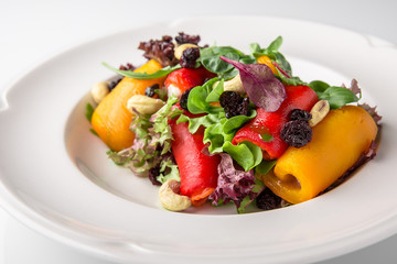 Appetizer of grilled vegetables from zucchini, eggplants, tomatoes, sweet peppers, onions. Rolls...