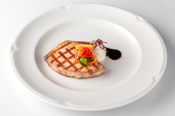 Grilled salmon fillet.  Banquet festive dishes. Gourmet restaurant menu. White background.