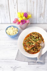 chicken drumsticks with mushroom and tomato