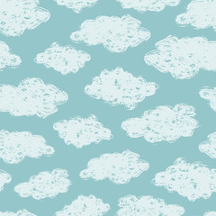 Vector seamless pattern with hand drawn clouds in the sky. Simple drawing of clouds ideal for nursery designs, wallpaper, wrapping.