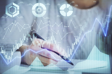 Forex chart displayed on woman's hand taking notes background. Concept of research. Multi exposure