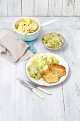 prk schnitzel with braised cabbage and potatoes