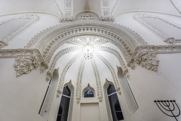 eclectic elements of the interior of a large choral Jewish synagogue