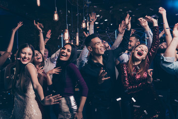 Fototapeta Portrait cute attractive lovely youth millennial person laugh excited funny funky motion having fun free time raise fists fromal wear suit dress fashionable modern magnificent indoors dance floor obraz
