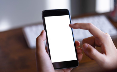 Woman holding smartphone with blank screen.Take your screen to put on advertising.