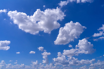 Naklejka na ściany i meble Light Stratocumulus clouds at deep blue sky.Natural sky background texture