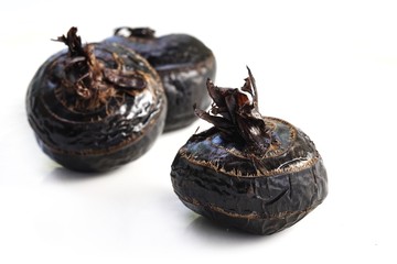 Boiled Truffles or boiled Chinese water chestnut on white background, Selective focus and free space for text. Shooting in studio for advertising.