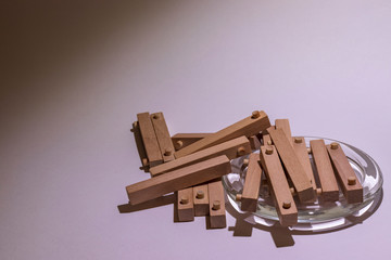 wooden beams in miniature on white background