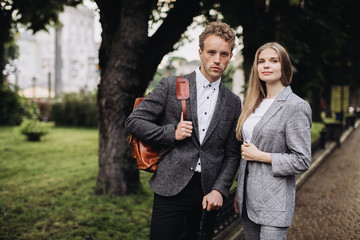 Young people having a business meeting outdoors