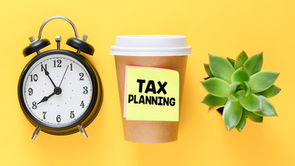 TAX planning business text concept.