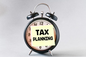 TAX planning business text concept.