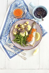 trout with potatoes, onion, green bean and pepper sauce