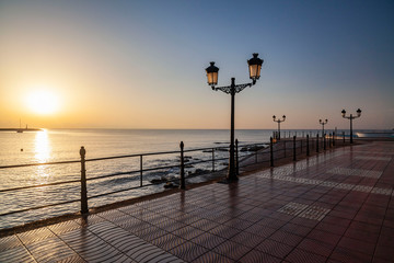 Santa Eularia des Riu, beach, bay and maritime promeande at dawn. Ibiza island, Balearic Islands, Spain.