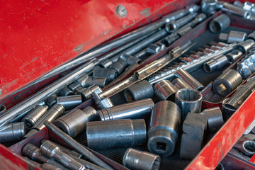 A set of tools for technical support machines on the race. Box with set of tools for car repair, closeup.