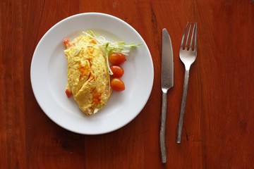Omelette is pancakes of eggs, The good healthy breakfast in the morning, Selective focus and free space for text, healthy food background ideas concept.