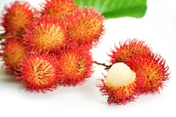 Rambutan on white background. This image stacked for advertising. The tropical fruits ideas concept.