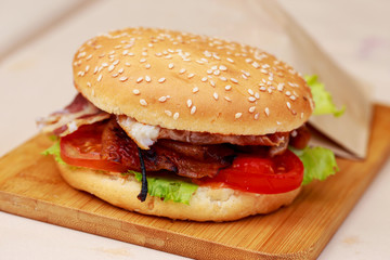 Burger on a wooden board