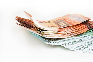 Pack euro money banknotes on white background. Euro cash background. Money savings concept.