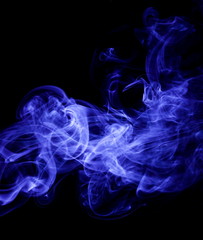 Blue smoke on black background