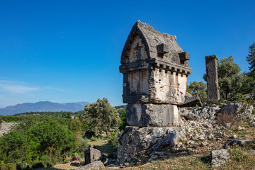 Fototapeta premium Ancient Lycian Pillar Tomb in Pinara, Fethiye, Turkey