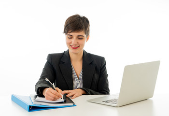 Portrait of happy attractive young businesswoman working on her