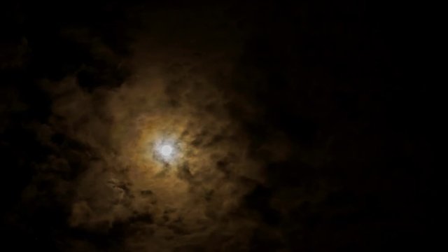 Time lapse of moon and cloudy in the night, Chiangmai Thailand