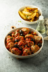 Roasted chicken with tomato and olives