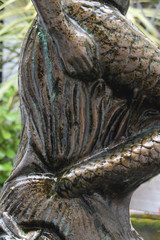 Detail of a statue of a mermaid Rye Sussex