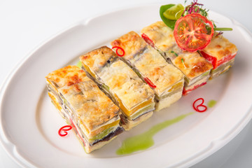 Quiche, casserole, delicious omelet from eggs, cheese, salmon, broccoli, spinach, pate. Banquet festive dishes. Gourmet restaurant menu. White background.
