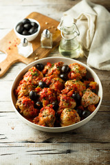 Roasted chicken with tomato and olives