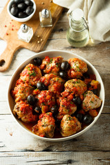 Roasted chicken with tomato and olives