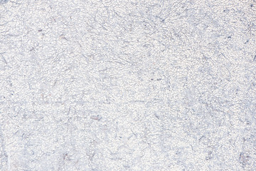 Old grungy wall with damaged plaster background texture.