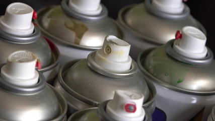 Spray Painting Street Art. Aerosol spray cans nozzle close up