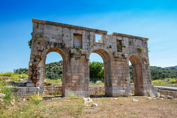 Patara (Pttra). Ruins of the ancient Lycian city Patara. Amphi-theatre and the assembly hall of Lycia public. Patara was at the Lycia (Lycian) League's capital. Aerial view shooting. Antalya, TURKEY